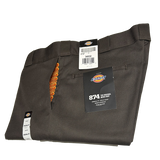 Folded brown pants with Dickies branding work wear pants