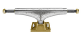 skateboard trucks with gold and silver design