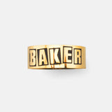 Gold-toned Brand Logo Ring | Baker. Wide band featuring the word 'BAKER' in bold, engraved letters.