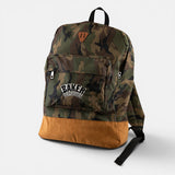Baker Brand Logo Camo Backpack with brown bottom, front pocket and "Baker Skateboards" logo.